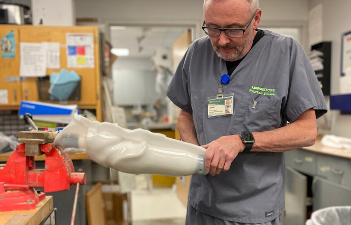 UAB employee constructing prosthetic leg