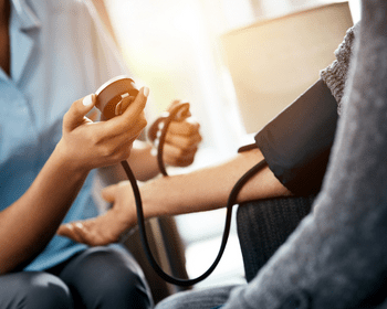 patient having their blood pressure taken for World Hypertension Day