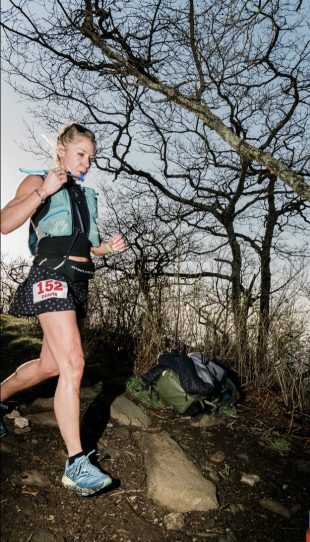 Arrington running in the woods