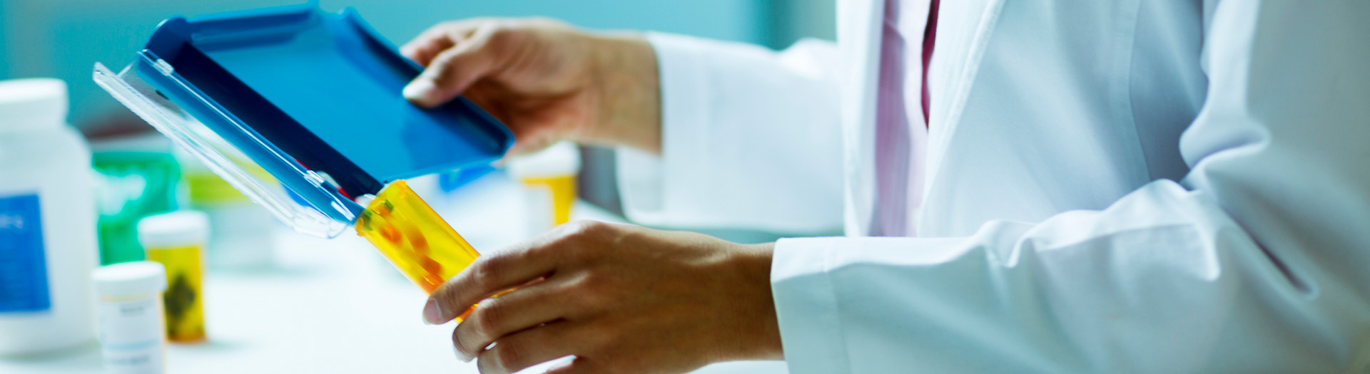 Pharmacist preparing a medication for a patient