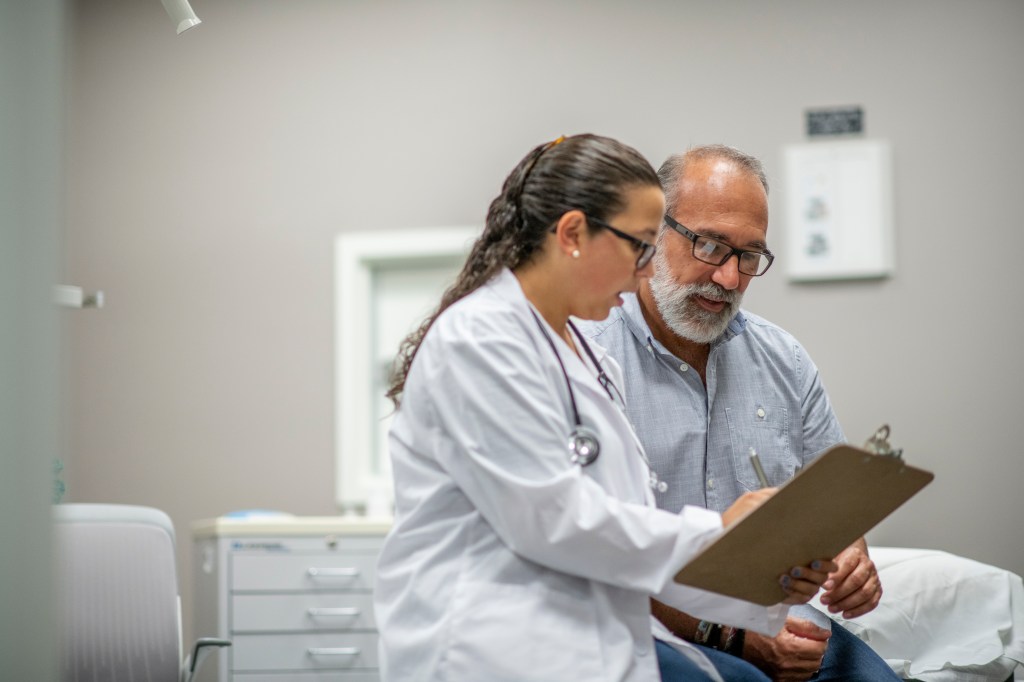 doctor and patient discussing clinical trials